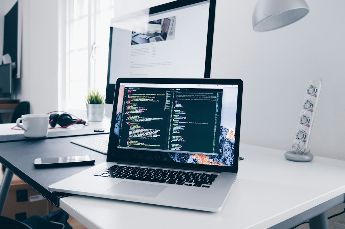 Custom web development code on a laptop screen